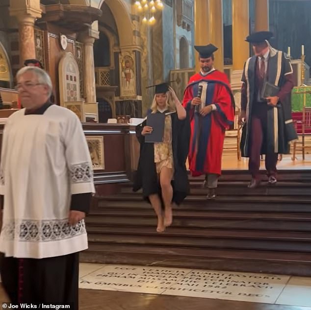 Overjoyed: He took to Instagram throughout the day to document the ceremony, sharing snaps of himself beaming from ear-to-ear after being handed his doctorate