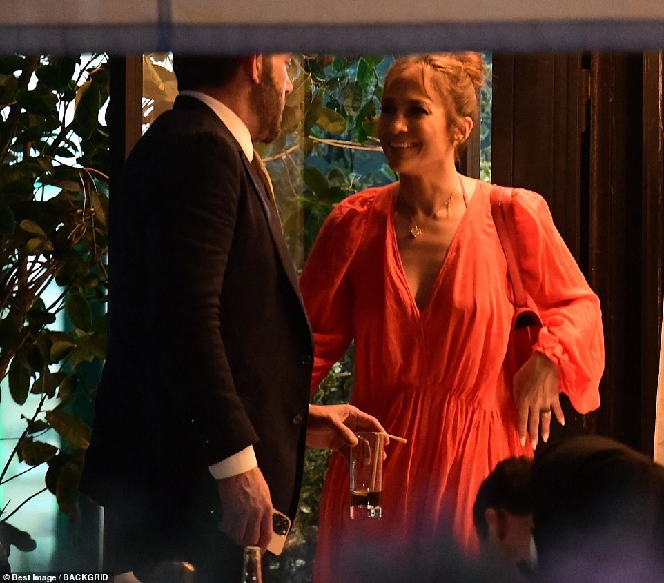 Look of love: The singer, 52, and the actor, 49, packed on the PDA during their evening meal at Le Matignon restaurant