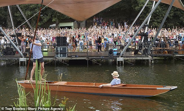 Festival weather: Festivalgoers are set to enjoy a fairly sunny weekend, according to the Met Office, including some cloudy spells. Revelers pictured on Friday