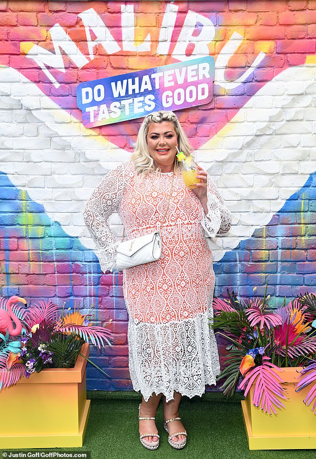 Fabulous: The former TOWIE star, 41, opted for a summery display in an orange dress with a white lace overlay, with the outfit highlighting her recent weight loss