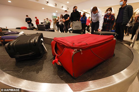 Qantas is battling mass flight cancellations, lengthy customer delays and misplaced baggage issues causing chaos for travellers months on from borders re-opening. Pictured: Hobart airport