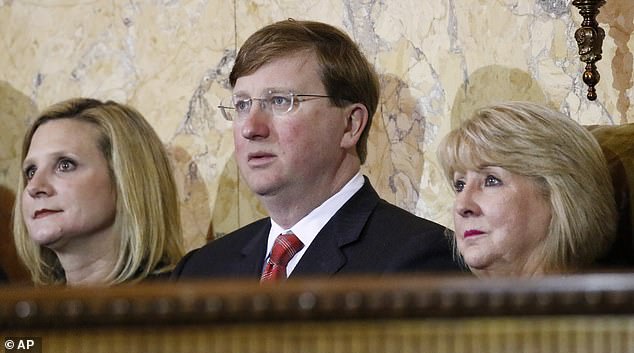 Pigott believes his firing was orchestrated by current Mississippi Governor Tate Reeves, center. He and Bryant are both Republicans