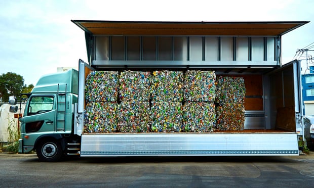 Truck carrying crushed plastic bottles