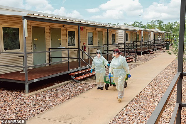 22,000 repatriated Australians, overseas fruit pickers, international students and athletes returning from the Tokyo Olympics isolated at Howard Springs (pictured)