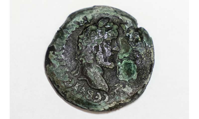 In a first, coin bearing zodiac found off Israel's coast