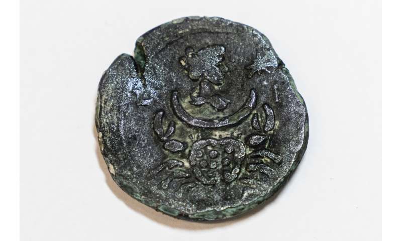 In a first, coin bearing zodiac found off Israel's coast