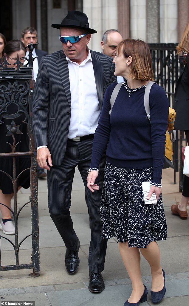 David and Isabel O'Brien (pictured outside court), moved into the four-bedroom semi-detached house next door in 2015