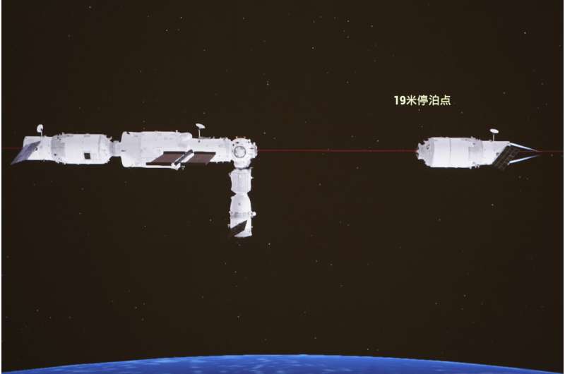 China spacecraft returns amid booster rocket concerns