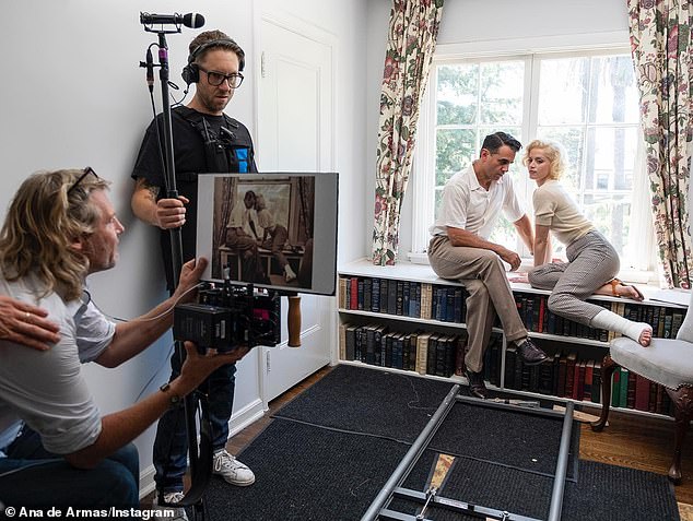 Exes: Her second husband, American baseball player Joe DiMaggio, is played by Bobby Cannavale, and the pair are pictured above recreating a shot of the couple