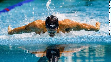 Cody Simpson competes in a men&#39;s 100m butterfly heat at last year&#39;s Australian Olympic trials.