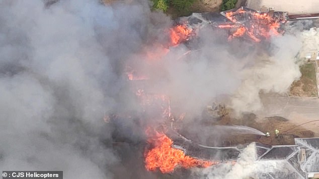 Huge flames have erupted inside an outbuilding in close proximity to the historic site in Hertfordshire