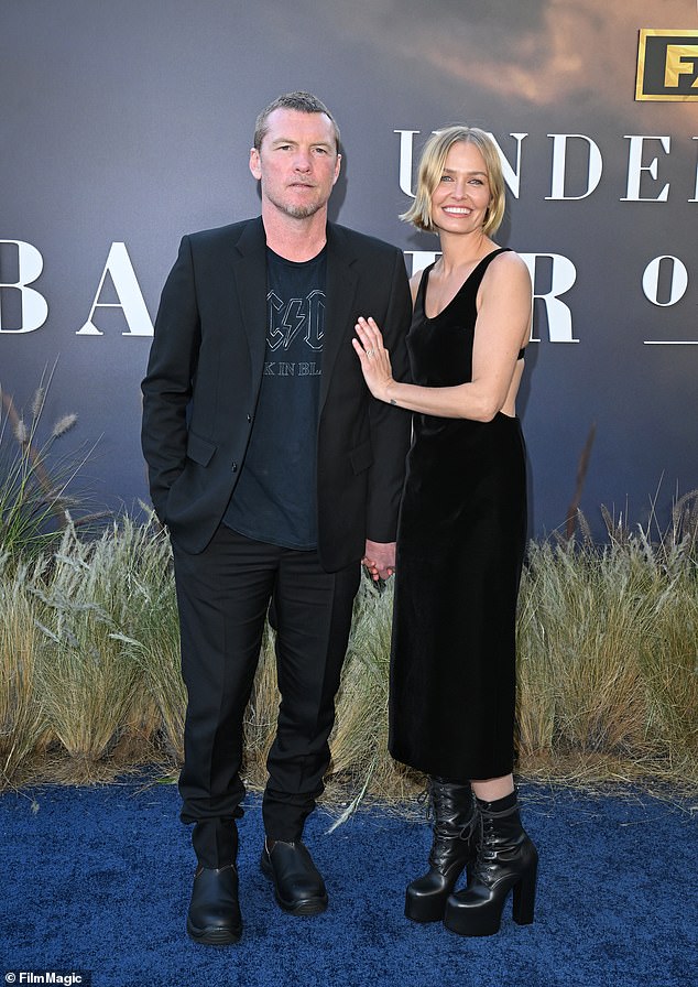 She concluded by thanking her friends and husband Sam Worthington (left)