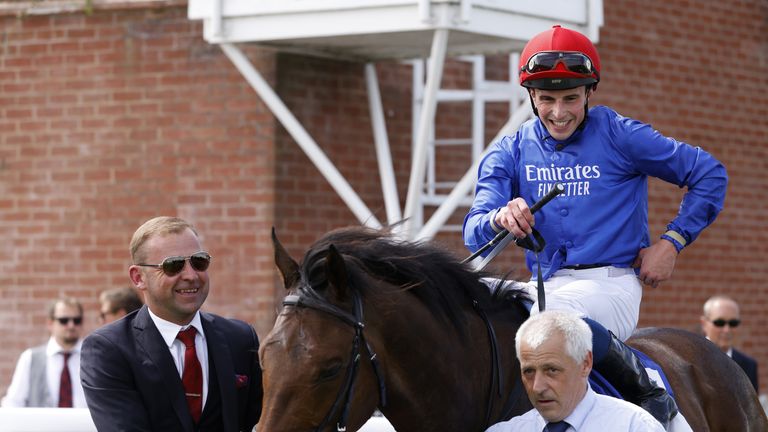 Buick smiles as Warren Point is led back into the Goodwood winner&#39;s enclosure