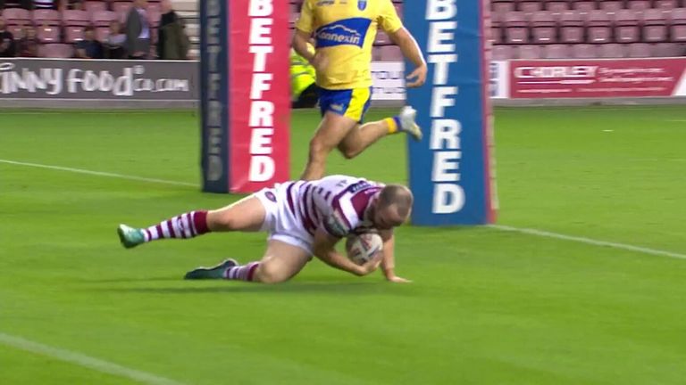 Wigan Warriors' Liam Marshall pounced on a Harry Smith kick to get his hat-trick against Hull Kingston Rovers