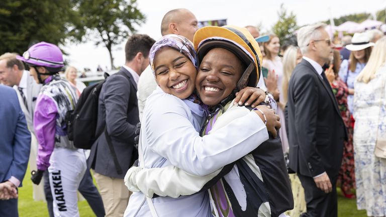 2019 Magnolia Cup winner Khadijah Mellah hugs fellow jockey O&#39;Meara Rusike