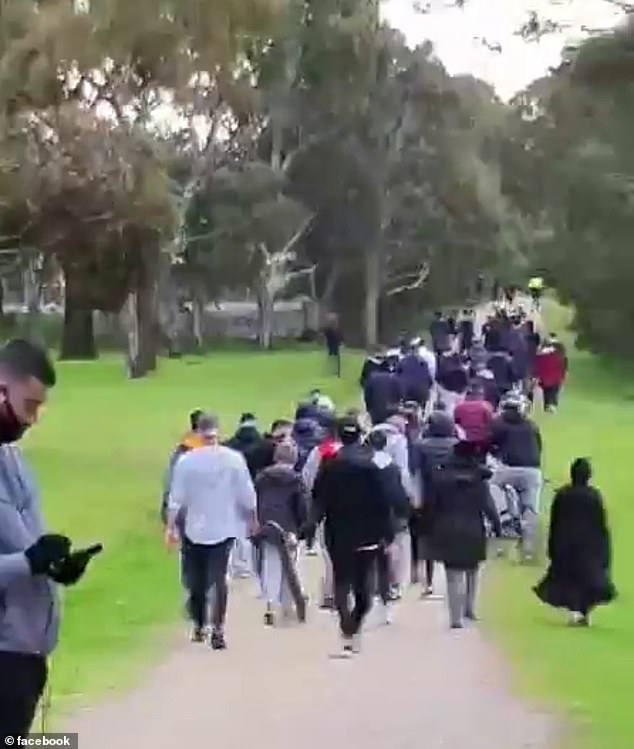 People in Dandenong gathered in large groups to walk at the same time during their allotted one-hour period of free exercise during Dan Andrews' lockdowns