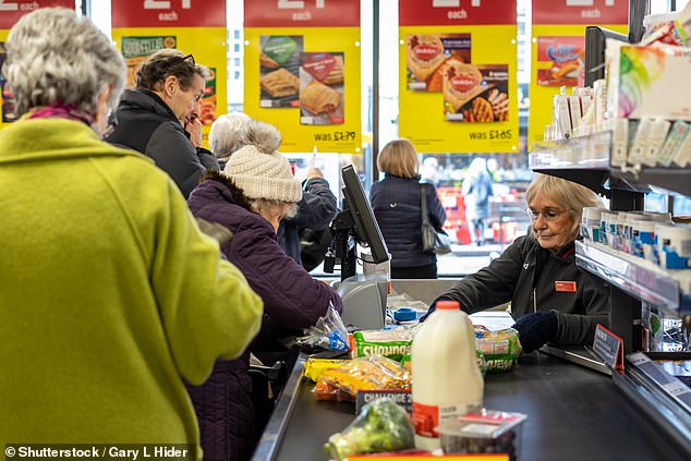 Four in ten Britons say using cash for their food shop helps them spend less and stick to their budget, according to Money.co.uk.