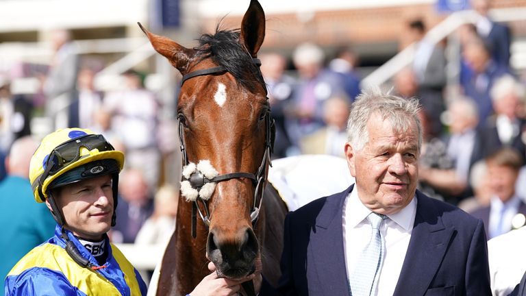 Sir Michael Stoute and jockey Richard Kingscote with Dante winner Desert Crown at York