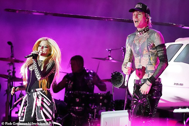 Famous friend: He also brought out his friend, Canadian superstar Avril Lavigne, 37, to perform with him at one point