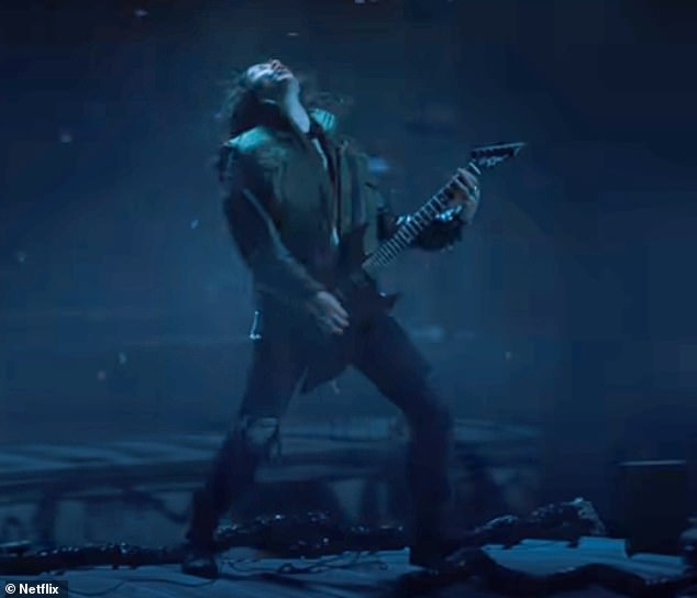 Rock n' roll: Stranger Things fans have lauded Quinn's guitar solo in the season four finale as the 'greatest scene of all time'; Pictured in a still from Stranger Things