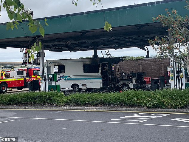 The blaze completely destroyed the front cabin and gutted the vehicle in front of horrified spectators before firefighters could extinguish it