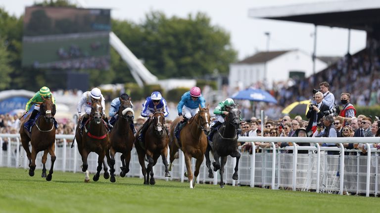 Many A Star (pink cap) wins at Goodwood under Tom Marquand