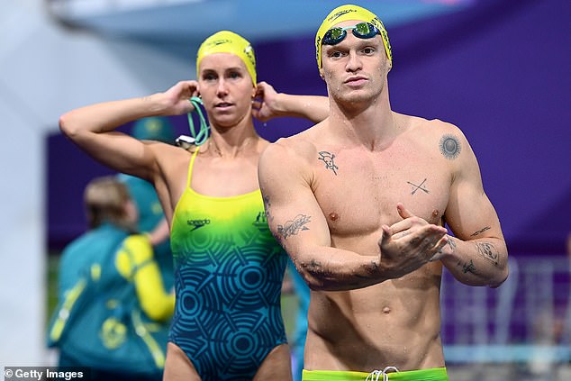 The love triangle began when Emma McKeon began dating teammate Cody Simpson (pictured together) after a brief relationship with fellow Aussie swimmer Kyle Chalmers last year