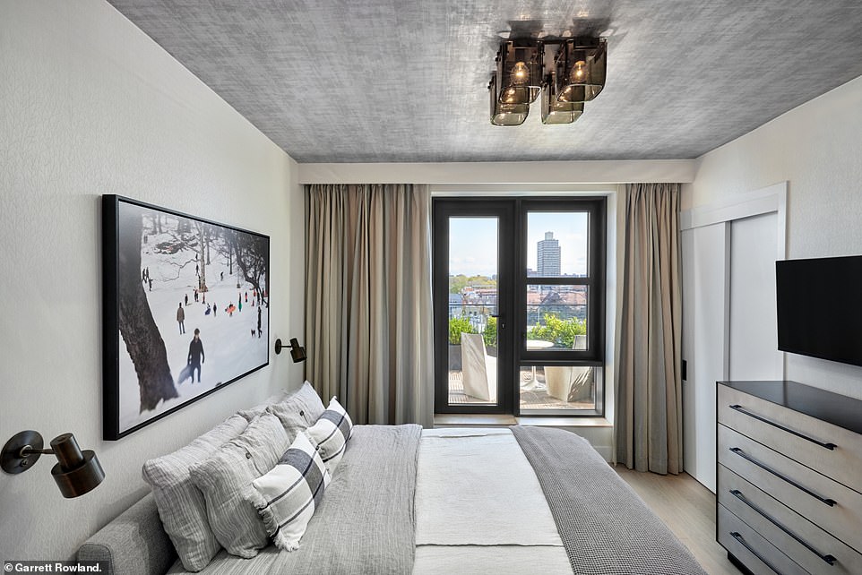 'We donned our hard hats with the developer, architect and our designer and customised what would have been a three-bedroom home into a unique, sprawling one-bedroom [apartment] with a home-office, den and dining alcove,' said Aspen. (Pictured: the bedroom)