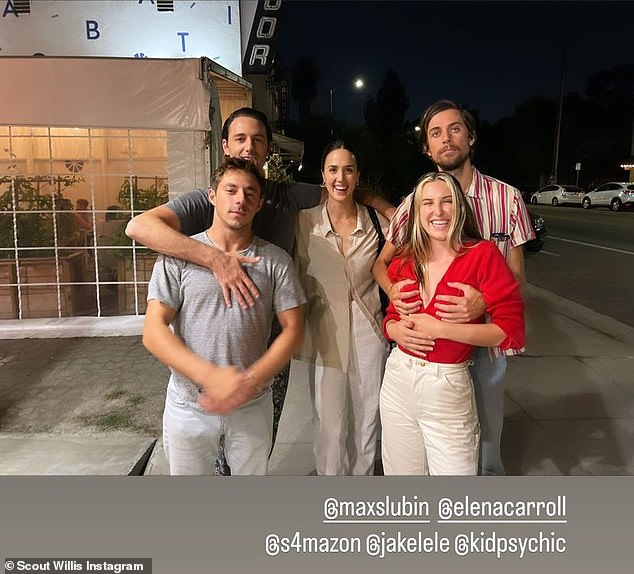 Handsy: Scout took to her Instagram Stories on Saturday to share candid snaps with her friends and boyfriend Jake Miller, who was seen grabbing her cleavage with his hands