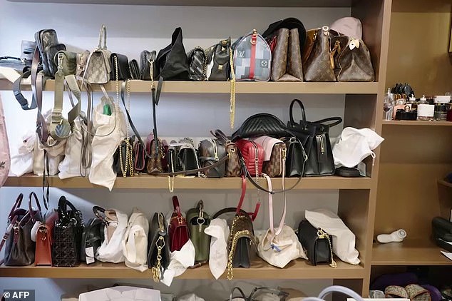 Operation Nairana began in late 2020 when the FBI and US Internal Revenue Service tipped off authorities that an Australian-based person was using cryptocurrency to launder money (pictured, designer bags found during the property raid)