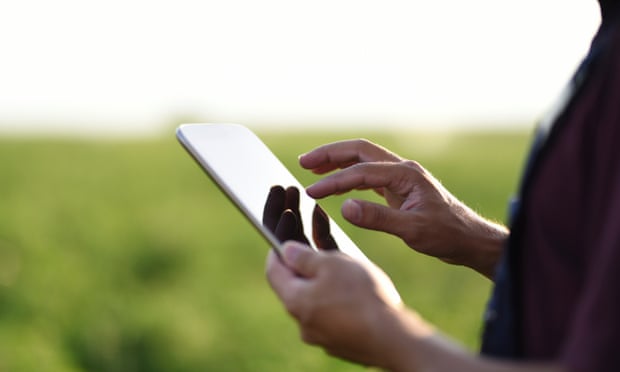 Young Farmer using a digital tablet. Technology is key to increasing agriculture productivity