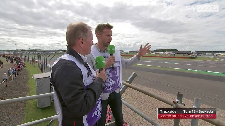 Martin Brundle and Jenson Button were trackside to watch the drivers face challenging conditions through Becketts Corner during second practice at the British Grand Prix.