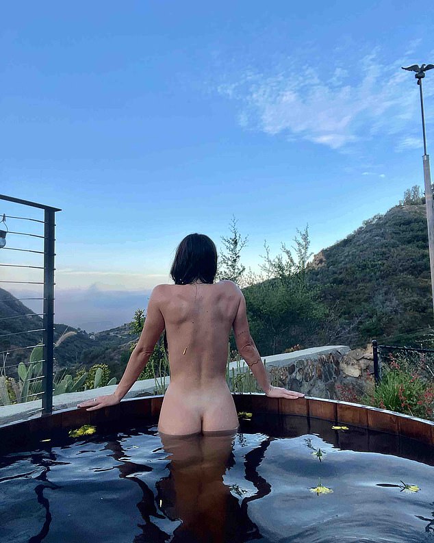 Nude alert: To celebrate her birthday last week, Scout dropped an eye-popping photo showing her completely naked from the back as she pulled her body out of a wood-lined hot tub