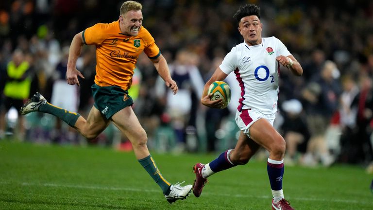 England's Marcus Smith runs clear to score a crucial try