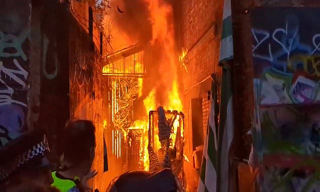 Emergency services scramble to tackle huge blaze at Brixton market as people are evacuated from area