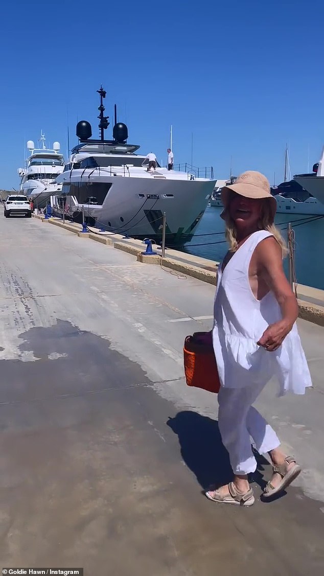 Goldie Hawn looks angelic in white as she bids farewell to Italy after family vacation