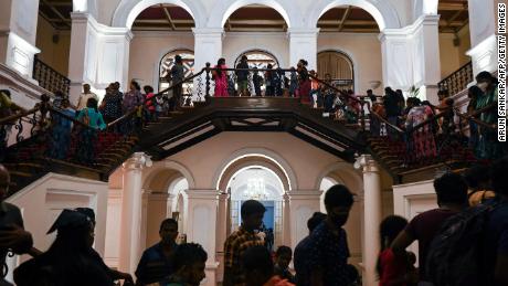 Protesters at Sri Lankan President Gotabaya Rajapaksa&#39;s official residence in Colombo on July 12.