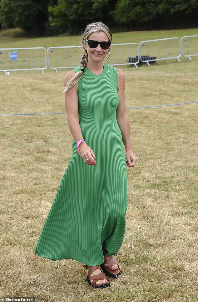 Helen Skelton stuns in a ribbed green maxi dress as she takes to the stage at CarFest North