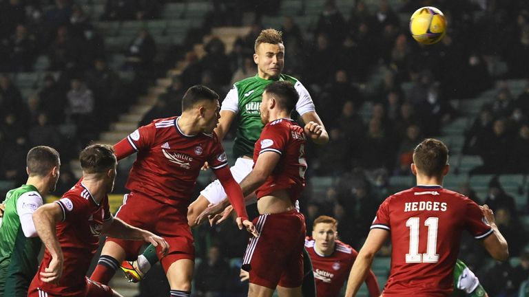 EDINBURGH, SCOTLAND - DECEMBER 22: Hibernians Ryan Porteous puts Hibernian 1-0 up during a Cinch Premiership match between Hibernian and Aberdeen at Easter Road, on December 22, 2021, in Edinburgh, Scotland. (Photo by Ross Parker / SNS Group)