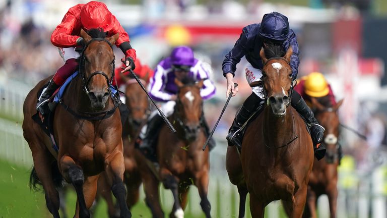 Tuesday, ridden by Ryan Moore, just gets the better of Emily Upjohn and Frankie Dettori