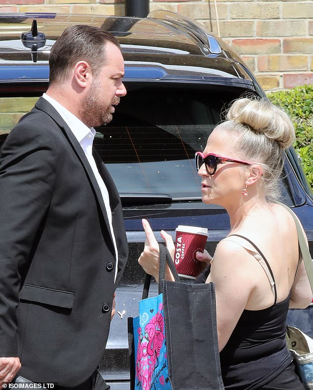 Kellie Bright and Danny Dyer look smart as they arrive to film EastEnders scenes at hotel