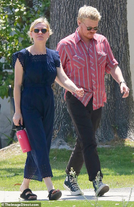 Kirsten Dunst EXCLUSIVE: Seen for first time since she wed Jesse Plemons in Jamaica, flashes ring