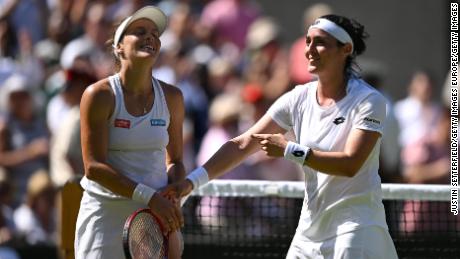 Jabeur (right) and Maria take in the applause after their Wimbledon semifinal. 