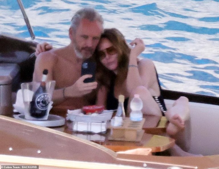 PICTURE EXCLUSIVE: Stella McCartney puts on a busty display in black plunging swimsuit in Italy