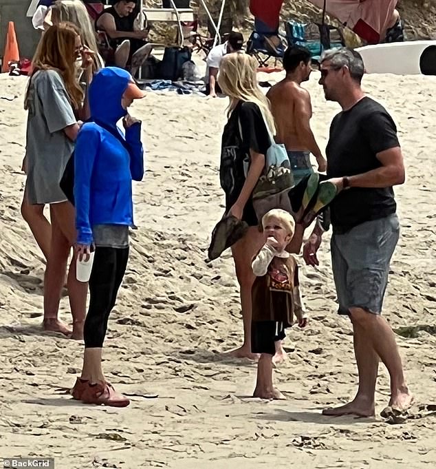 Renee Zellweger enjoys a day at Laguna Beach with her beau Ant Anstead and his son Hudson