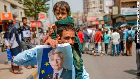 Yemeni demonstrators hold a portrait of UN special envoy Hans Grundberg during a protest demanding the end of a years-long blockade of the area imposed by Yemen&#39;s Houthi rebels on the city of Taiz, on July 26. Taiz, which has a population of roughly 600,000 people, has been largely cut off from the world since 2015, with hundreds of thousands suffering from malnutrition. 