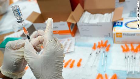 A nurse preps a syringe at a pop-up Covid-19 vaccination site at the Albanian Islamic Cultural Center, April 8, 2021, in the New York borough of Staten Island.