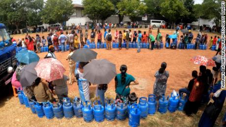 Sri Lankans wait in line for gas cylinders in Colombo.