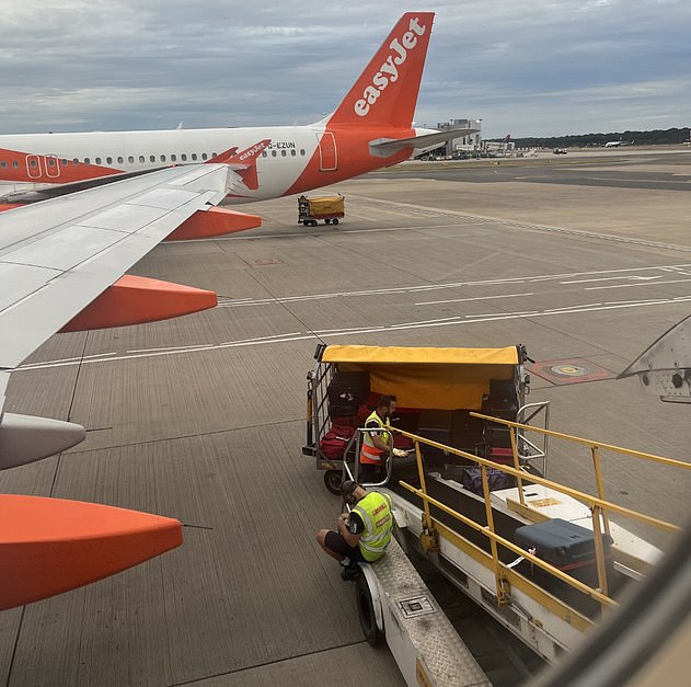 Student on delayed EasyJet flight out of Gatwick spots ground crew sitting on phone