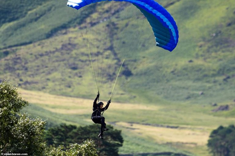 Tom Cruise parachutes off a MOUNTAIN to film Mission Impossible 8